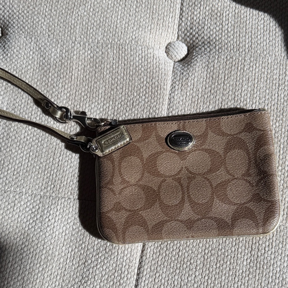 Coach Classic Beige zipper Wristlet with Silver Accents